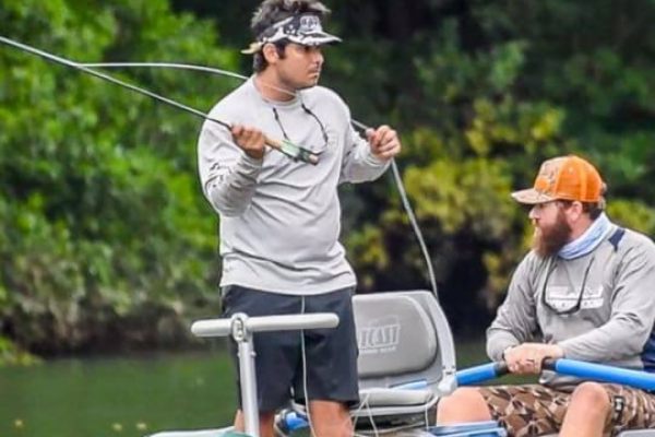 Anglers fly fishing from a drift raft on a Guanacaste jungle river